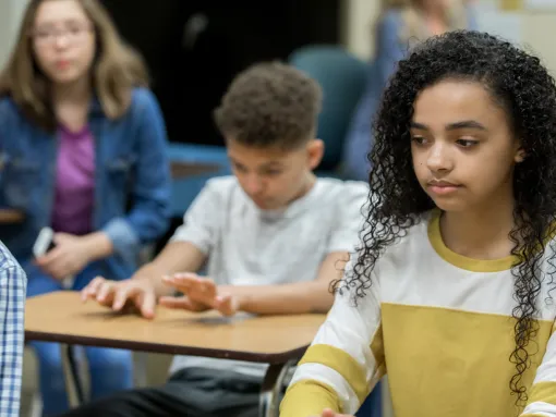 Diverse group of high school students looking bored and depressed